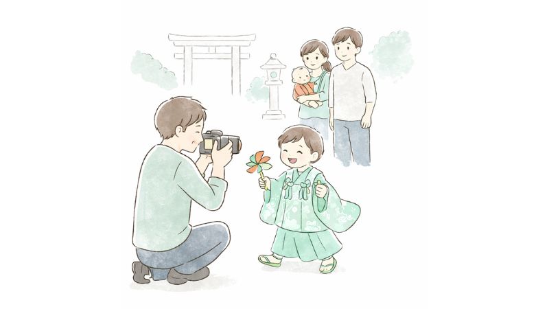 七五三とお宮参りで子どもの機嫌に気を配る家族とカメラマン